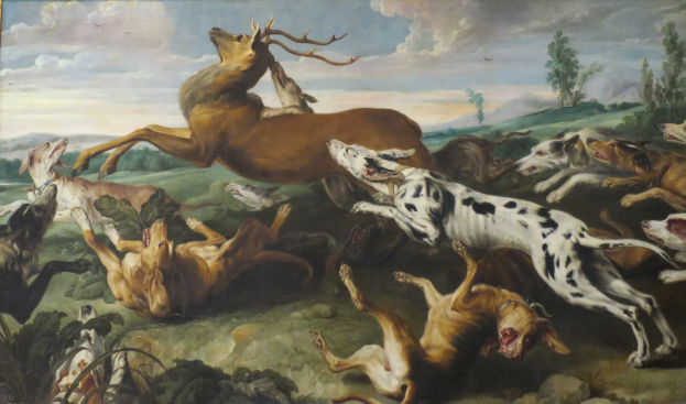 Ein Gemälde namens "Die Jagd nach dem Hirsch" von William Hogarth aus dem Jahr 1620 zeigt eine Gruppe von Hunden und einen Hirsch in einem bewaldeten Gebiet mit Bäumen, Pflanzen, Gras, Felsen und einem bewölkten Himmel.